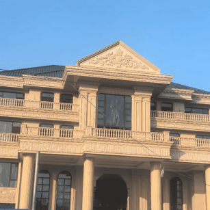 连云港黄金麻别墅外墙干挂石材效果示例