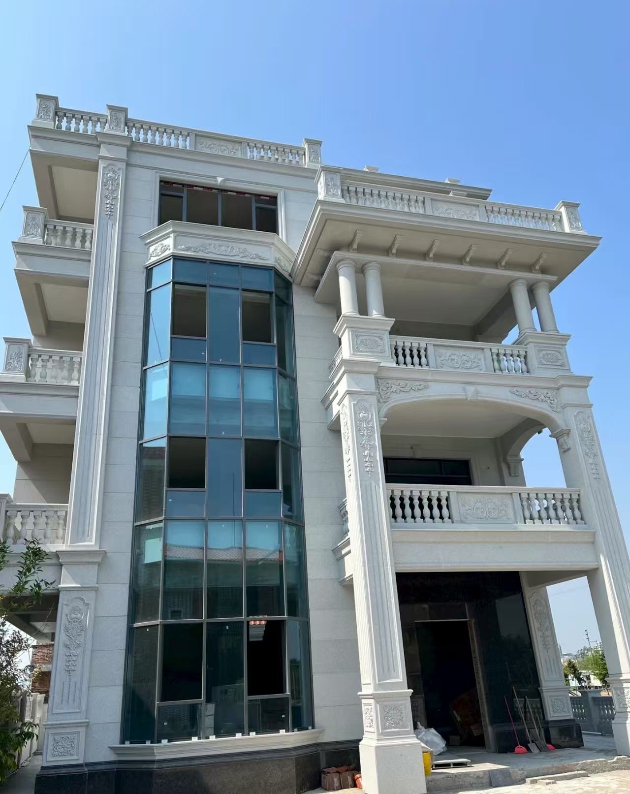 连云港 白麻花岗岩别墅外墙干挂效果展示